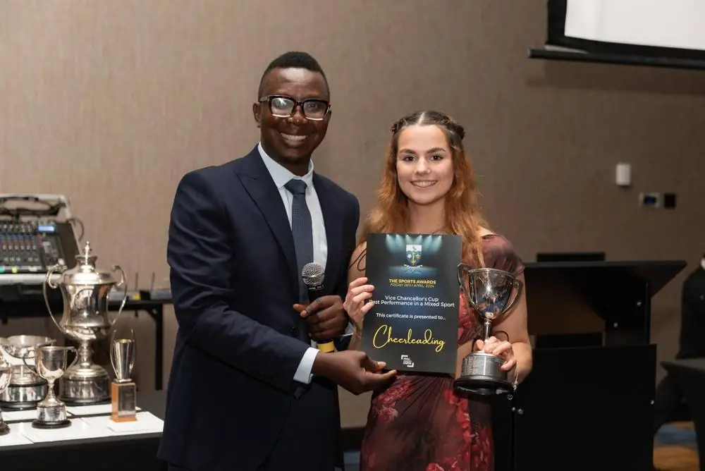 Ebenezer presenting the Vice-Chancellor’s Cup at the Sports Awards 2024